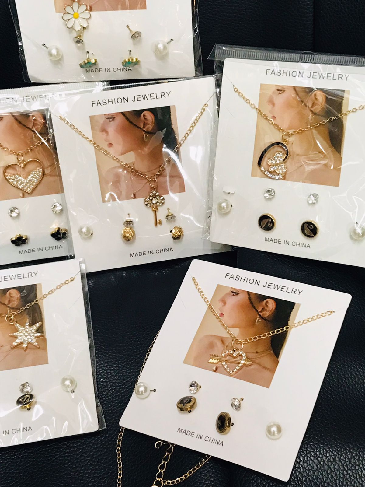 Elegant Gold-Tone Pendant & Multi-Stud Earring Set