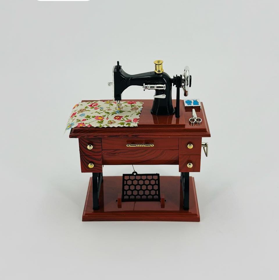 vintage-style miniature sewing machine music box